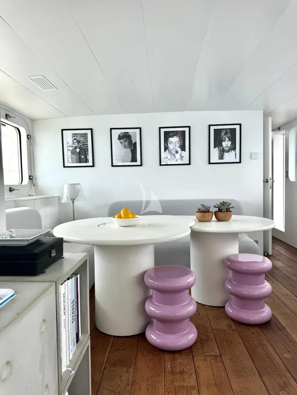 a room with a table and chairs aboard ABELY Yacht for Sale