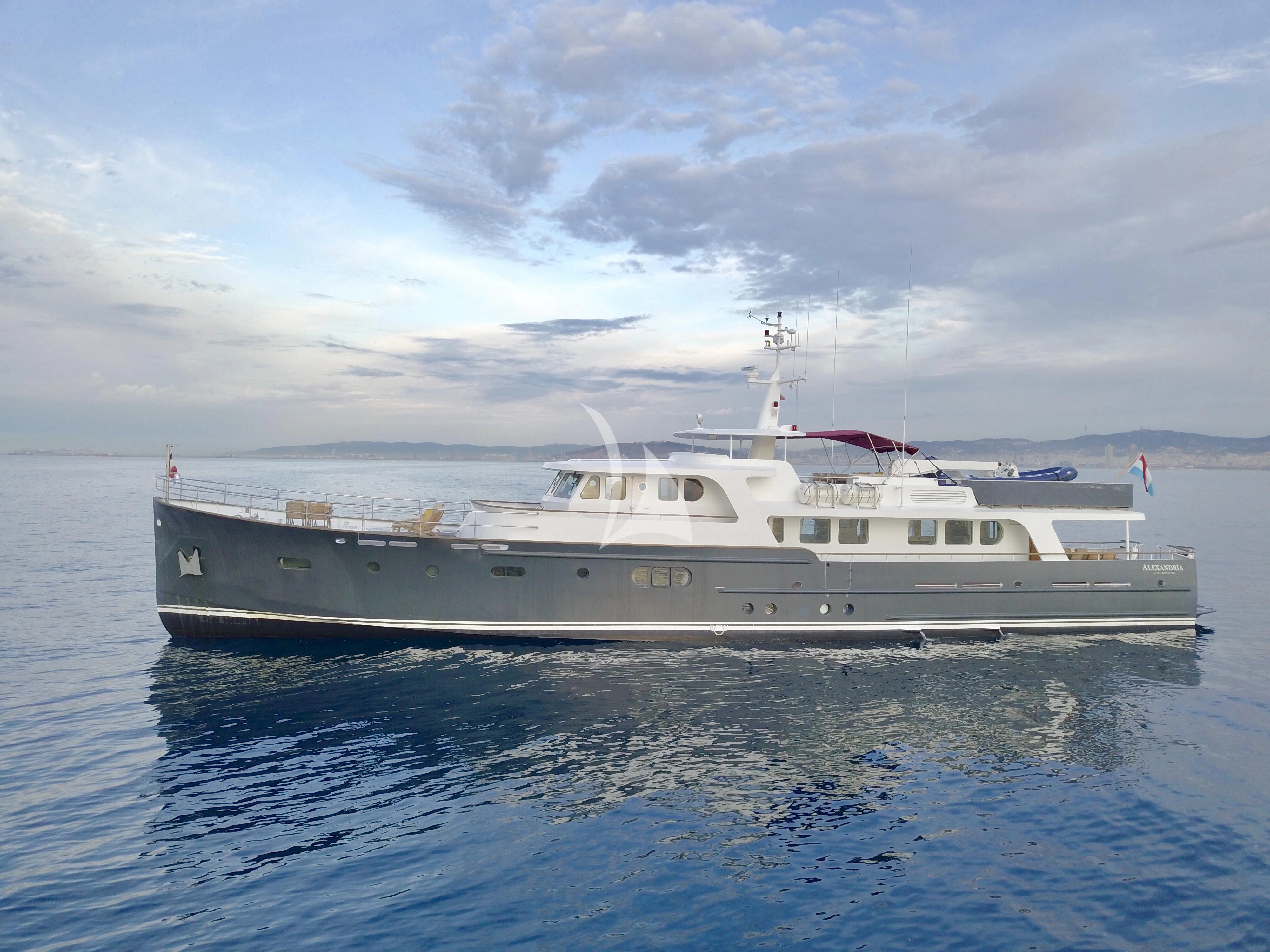 a white yacht in the water aboard ABELY Yacht for Sale