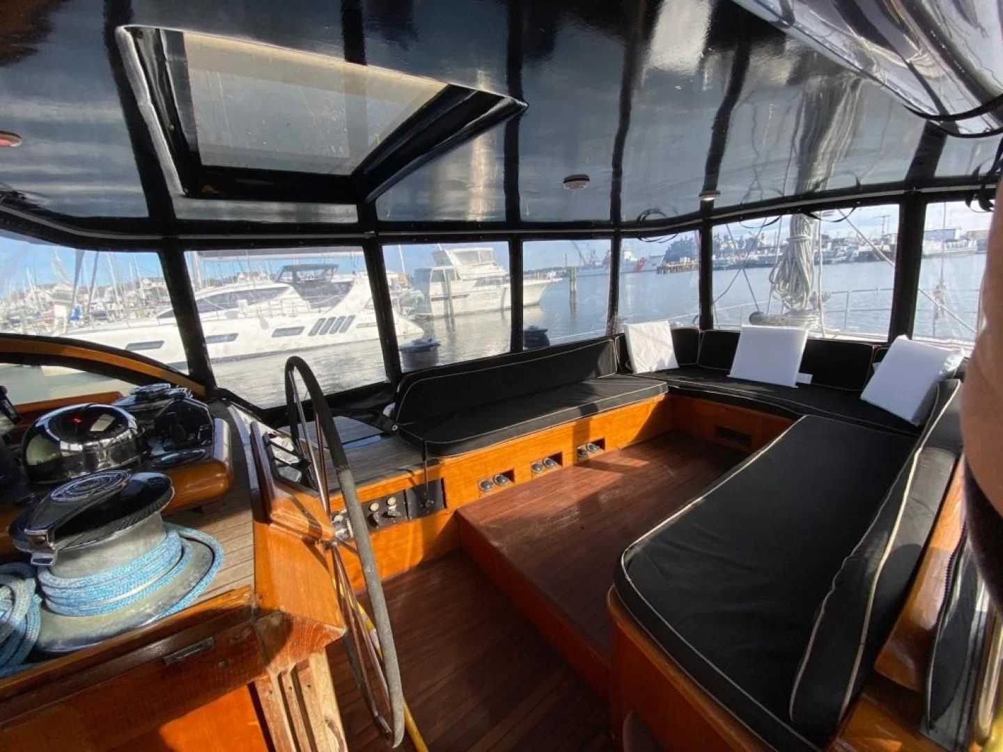 a room with a large window aboard LAUREN L Yacht for Sale