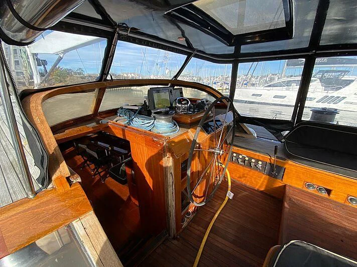 a large kitchen with a large window aboard LAUREN L Yacht for Sale