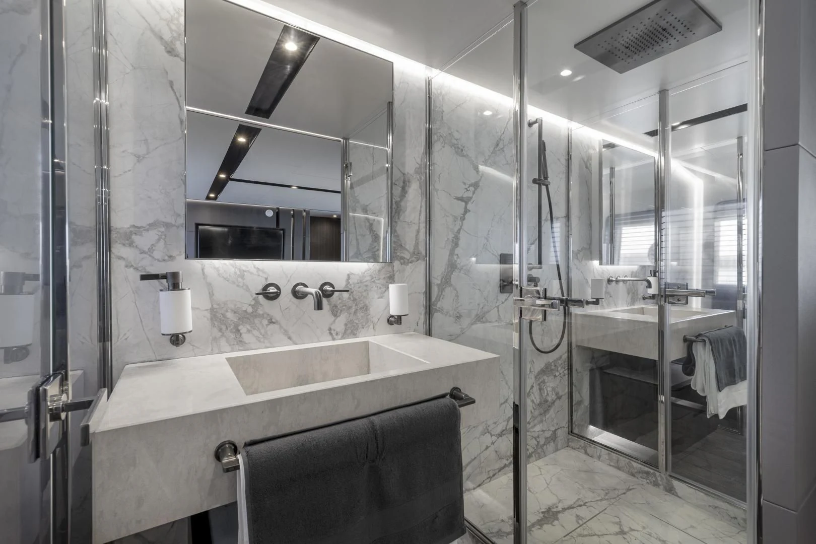 a bathroom with a tub sink and shower aboard SO SO NICE Yacht for Sale