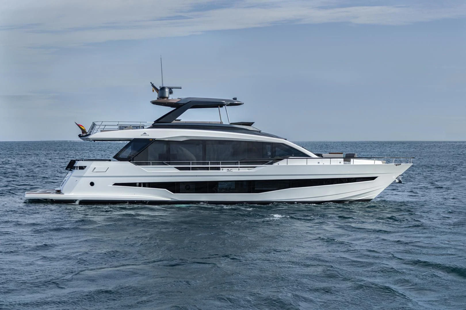 a white yacht in the water aboard SO SO NICE Yacht for Sale