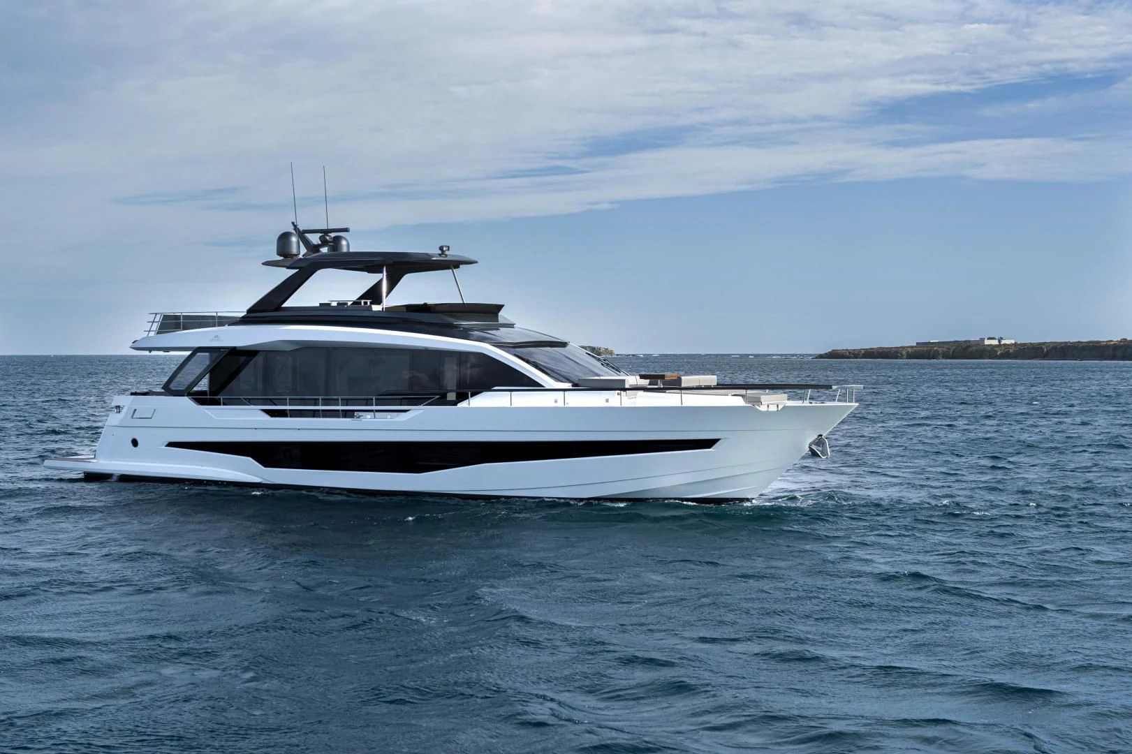 a white boat in the water aboard SO SO NICE Yacht for Sale