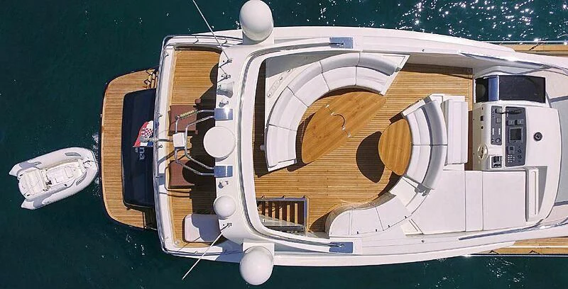 a space ship on a green surface aboard 888 Yacht for Sale