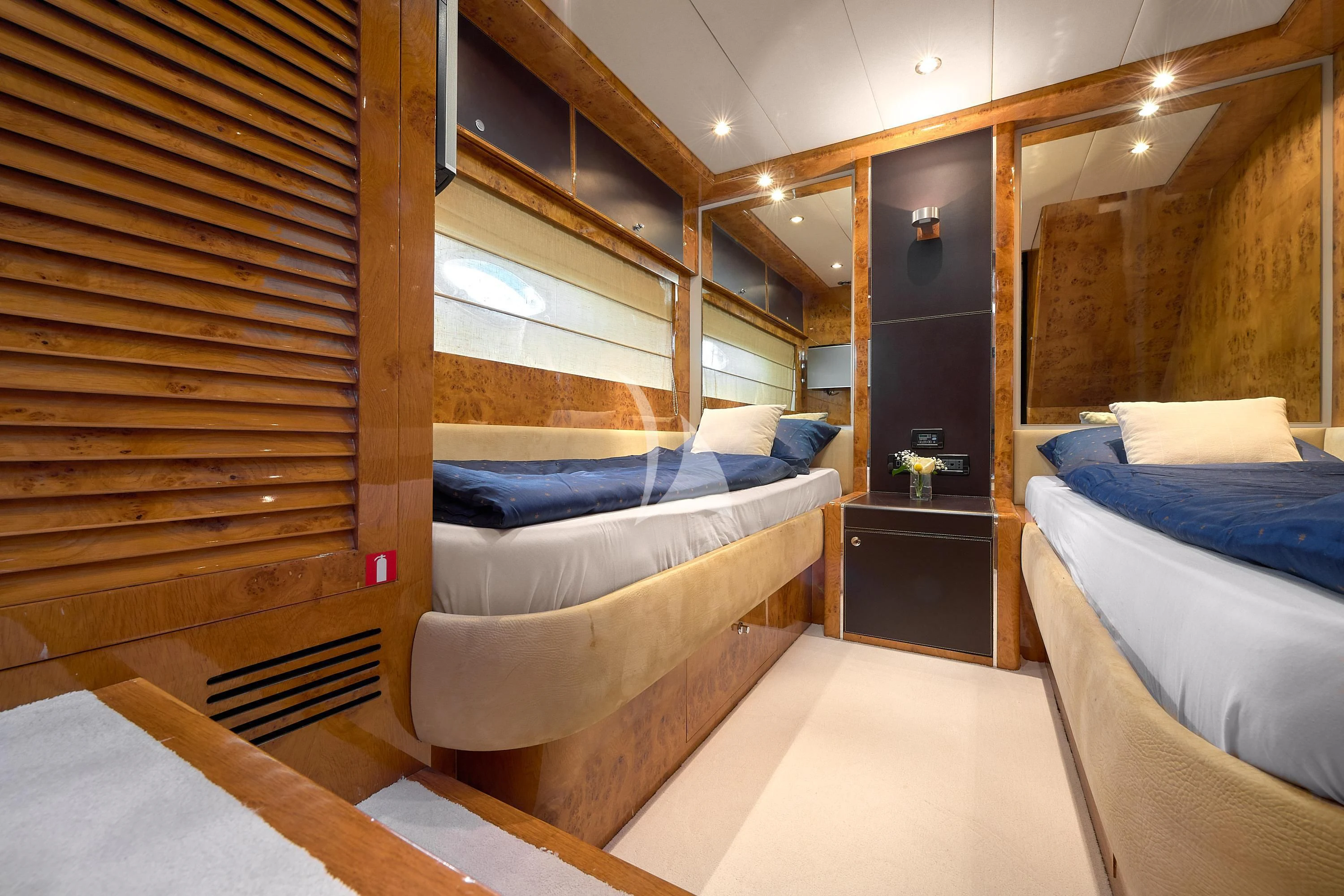 a room with a bed and a couch aboard 888 Yacht for Sale