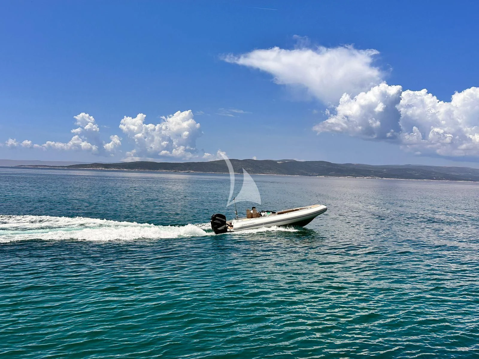 a boat on the water aboard 888 Yacht for Sale