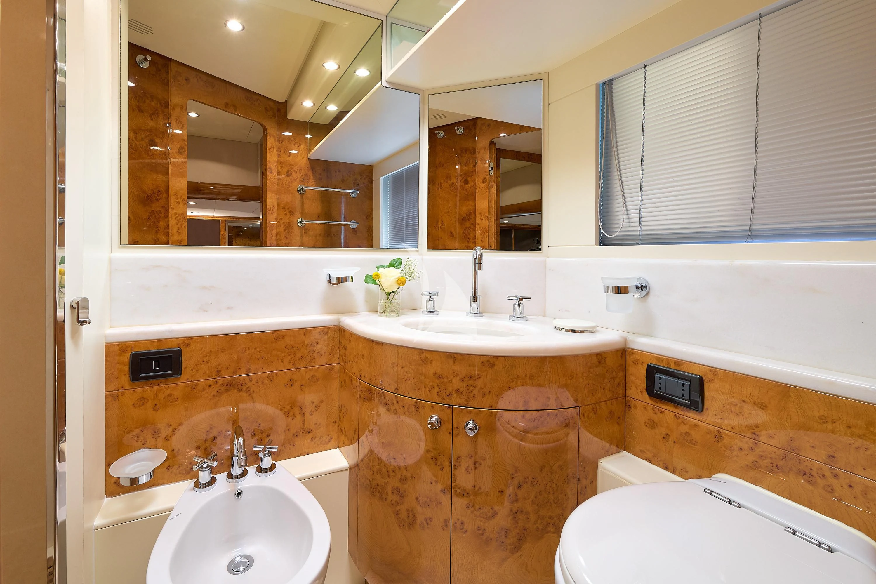 a bathroom with a sink and a bathtub aboard 888 Yacht for Sale