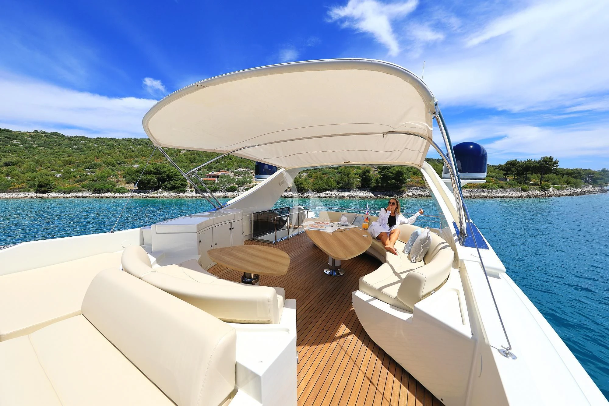 a boat with a canopy aboard 888 Yacht for Sale
