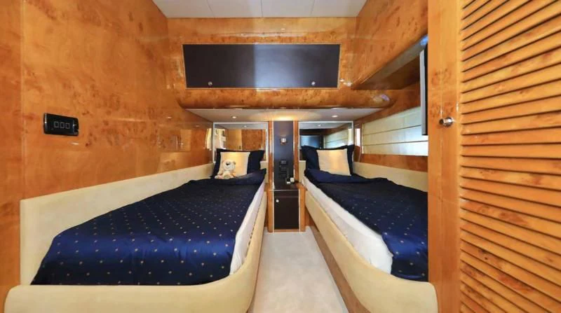 a room with a bed and a bed aboard 888 Yacht for Sale