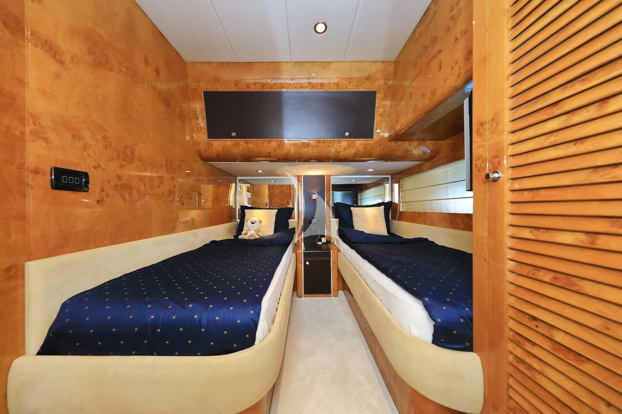 a room with a bed and a sink aboard 888 Yacht for Sale
