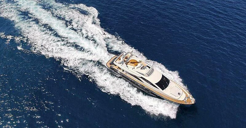 a white boat in the water aboard 888 Yacht for Sale