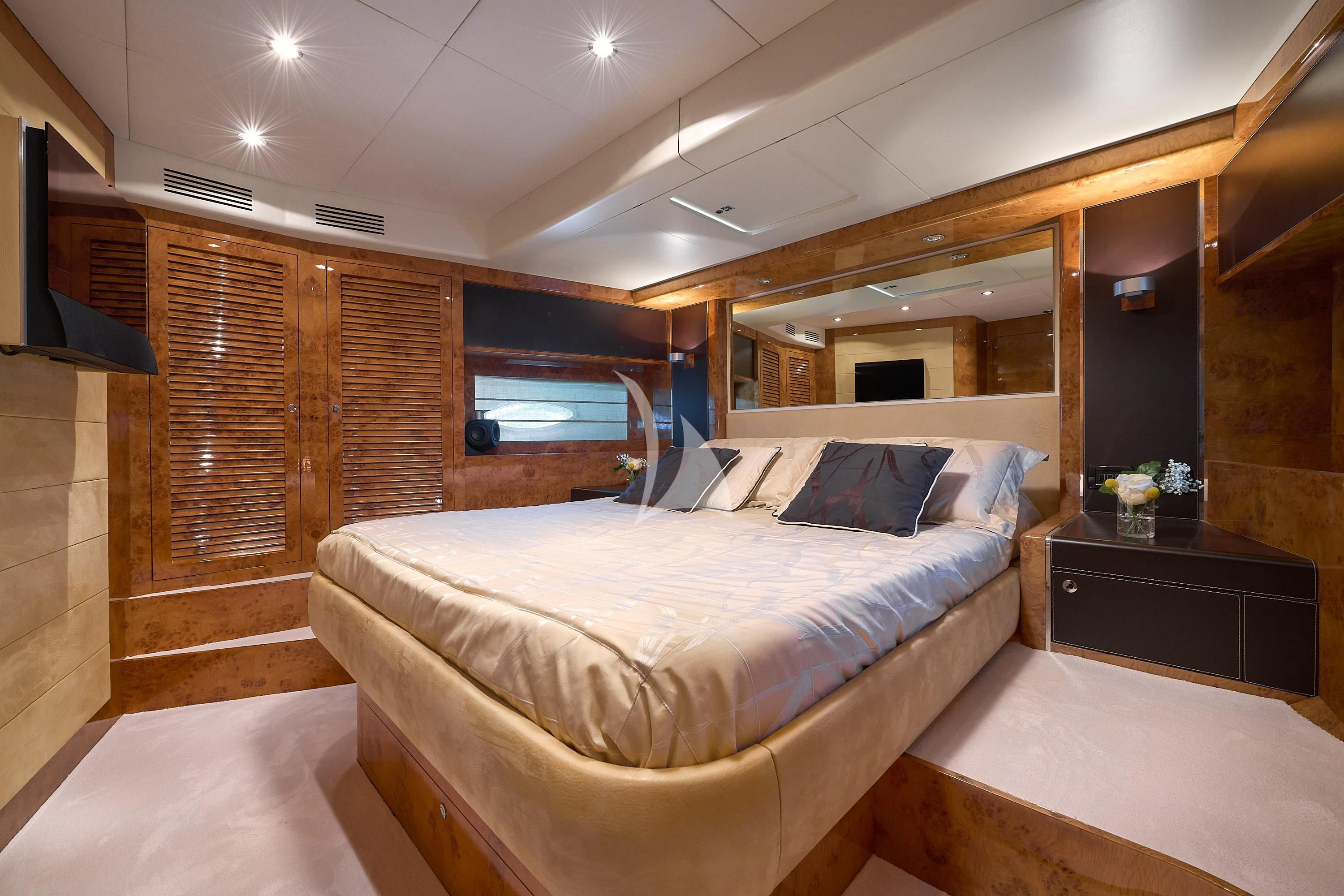 a large bedroom with a large bed aboard 888 Yacht for Sale
