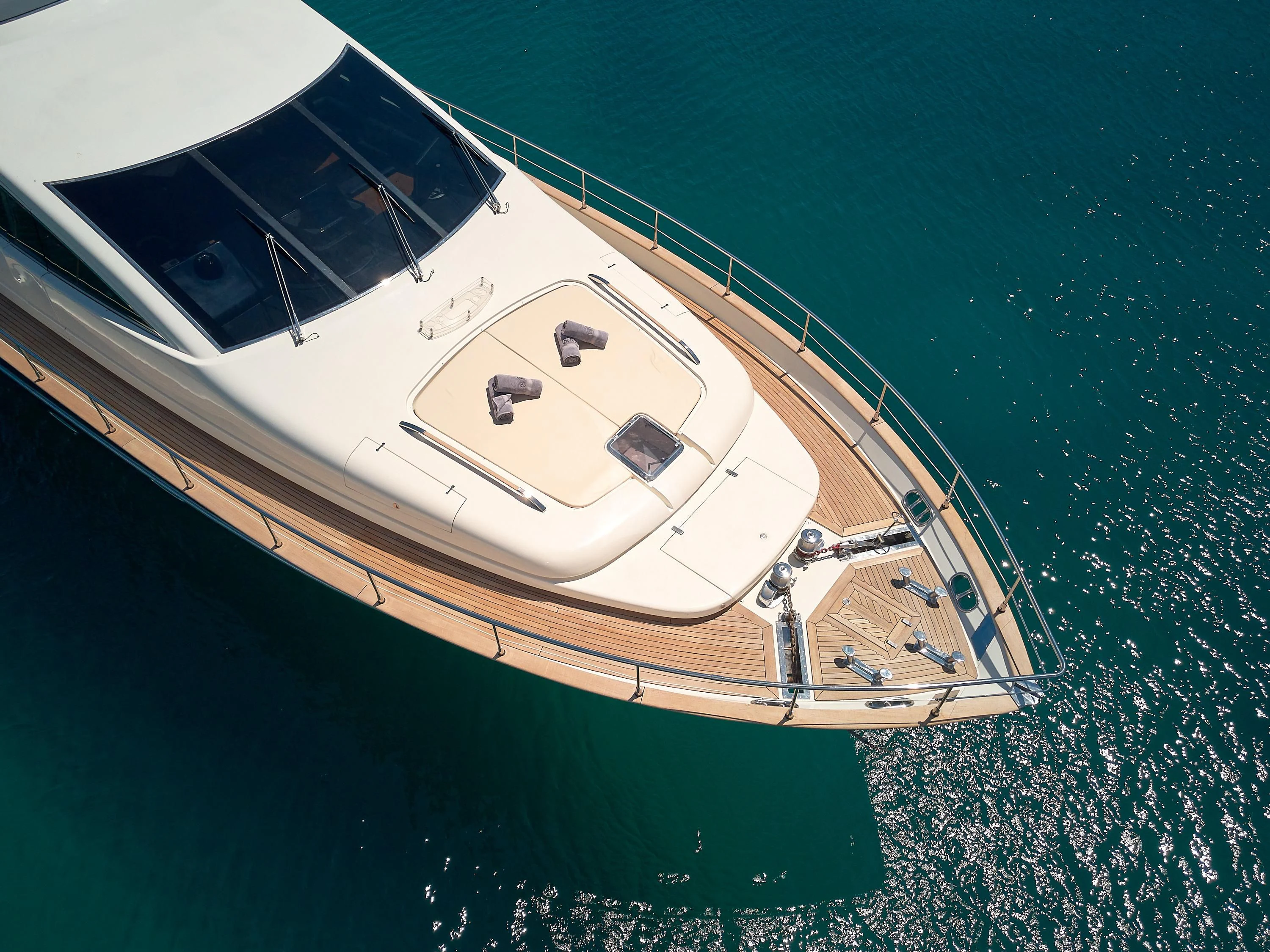 a white boat in the water aboard 888 Yacht for Sale