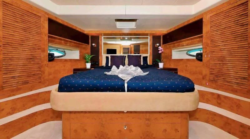a bed in a room aboard 888 Yacht for Sale