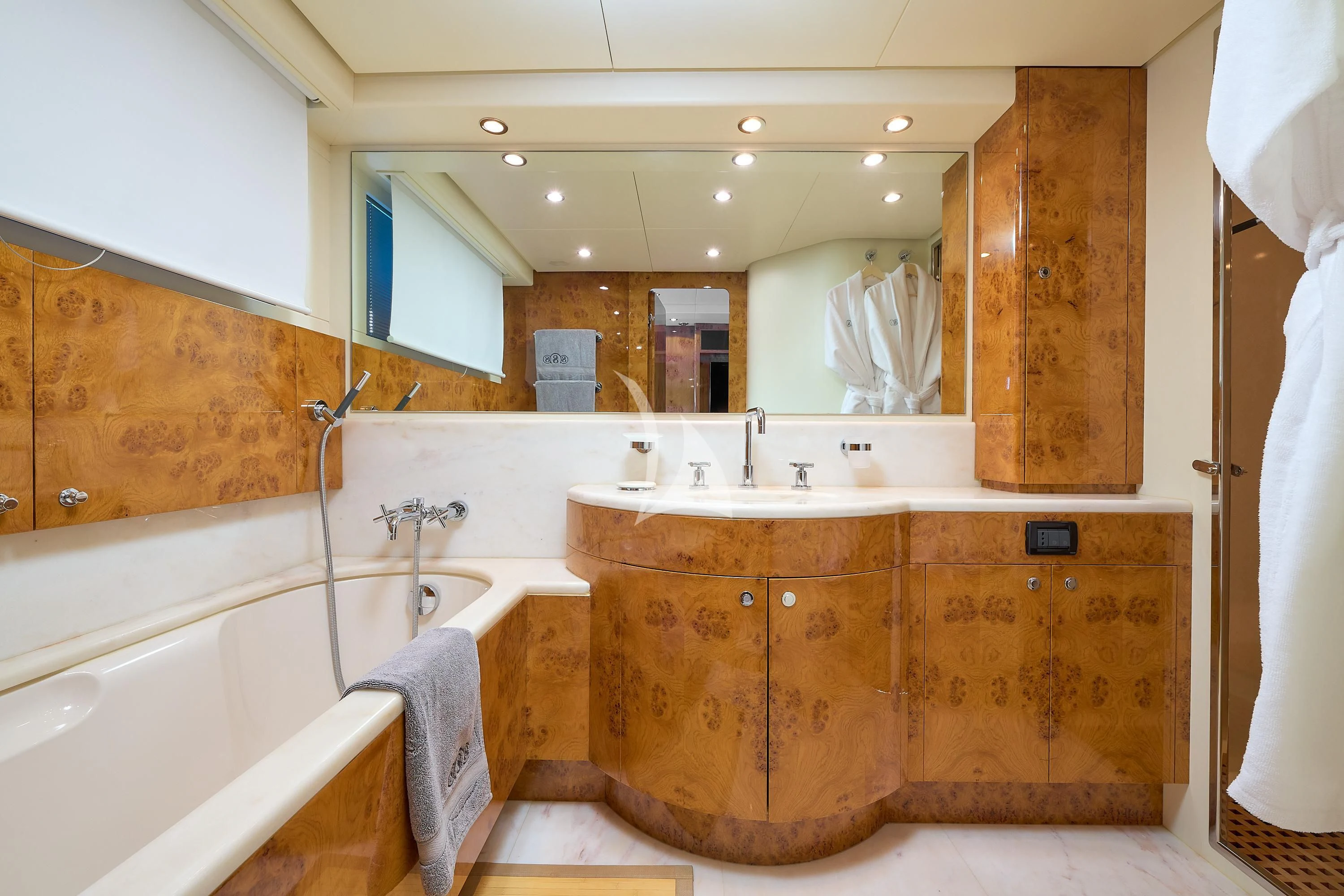 a bathroom with a bathtub and sink aboard 888 Yacht for Sale