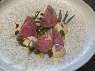 a plate of food aboard 888 Yacht for Sale