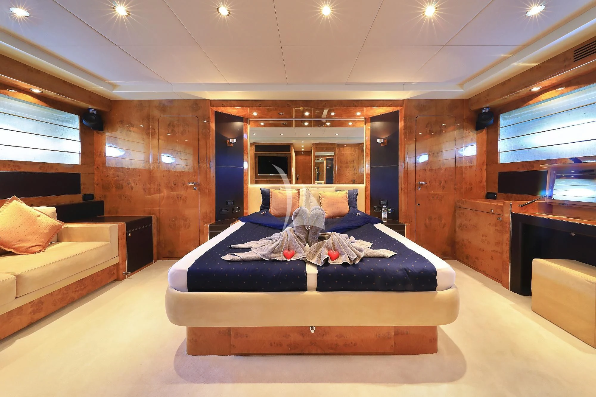 a room with a bed and a couch aboard 888 Yacht for Sale
