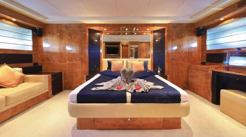 a bed in a room aboard 888 Yacht for Sale