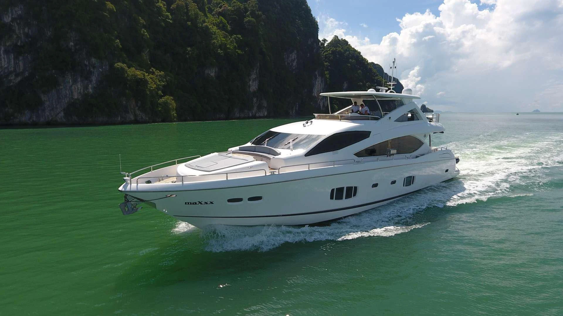 a white boat on the water aboard SYDNEY Yacht for Charter