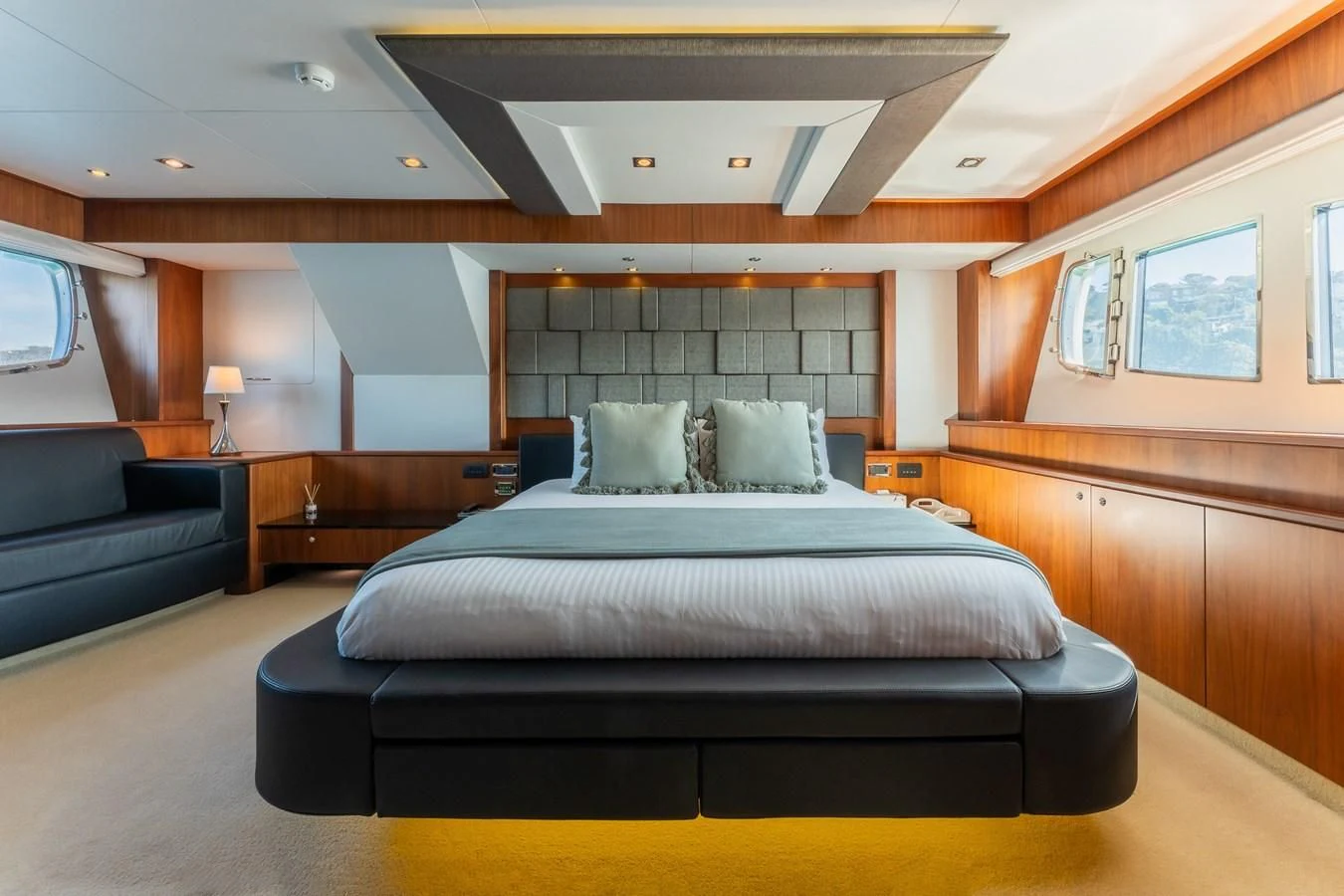 a large bed in a room aboard SYDNEY Yacht for Charter