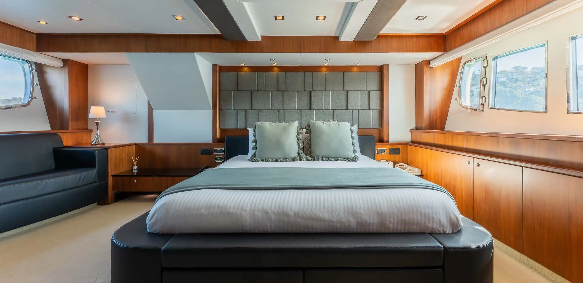a large bed in a room aboard SYDNEY Yacht for Charter