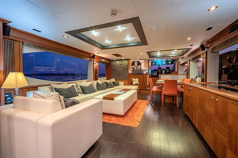 a living room with a large screen aboard SYDNEY Yacht for Charter