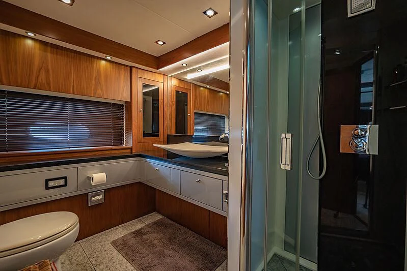 a bathroom with a large window aboard SYDNEY Yacht for Charter