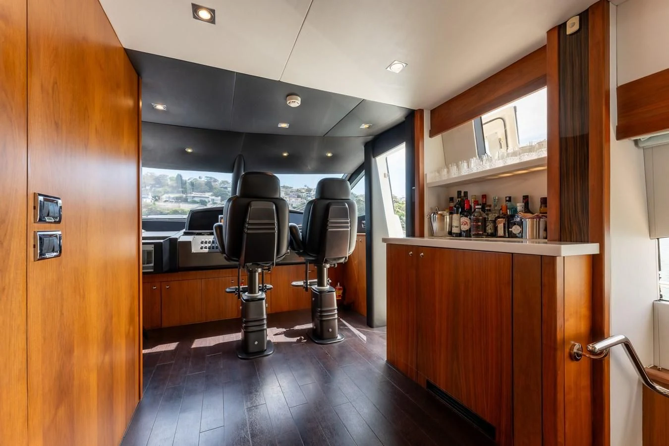 a room with a desk and a chair aboard SYDNEY Yacht for Charter