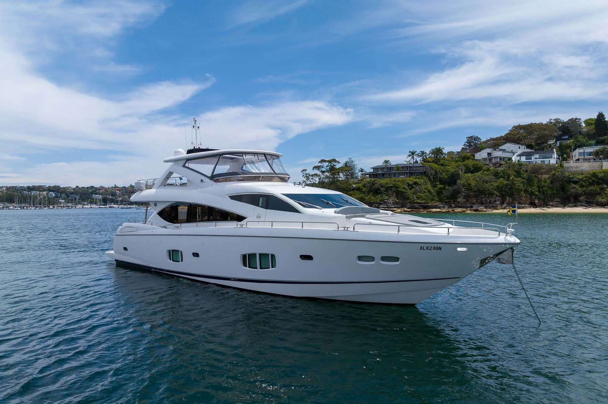 a white yacht on the water aboard SYDNEY Yacht for Charter