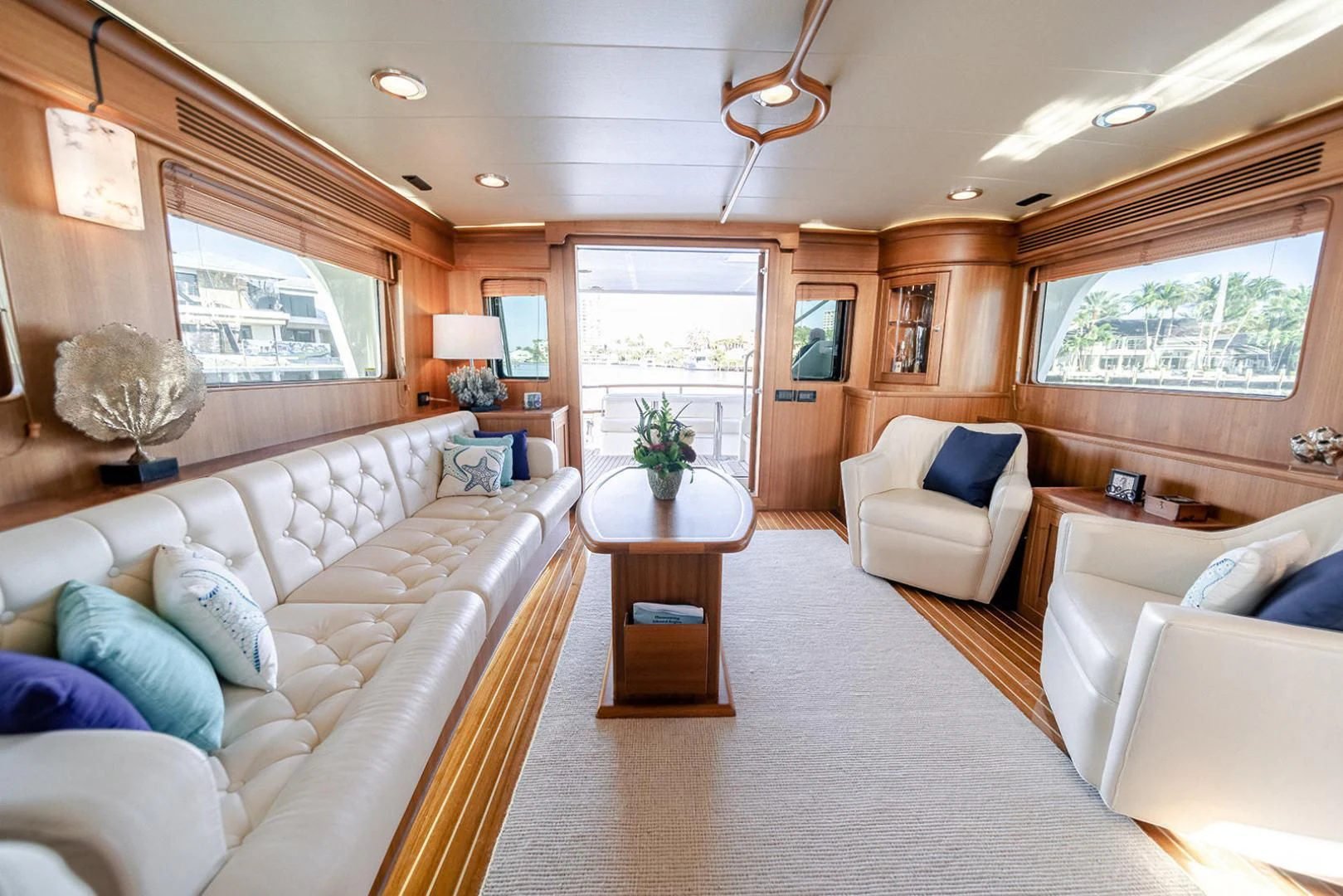 a living room with a large window aboard EASYWAY Yacht for Sale
