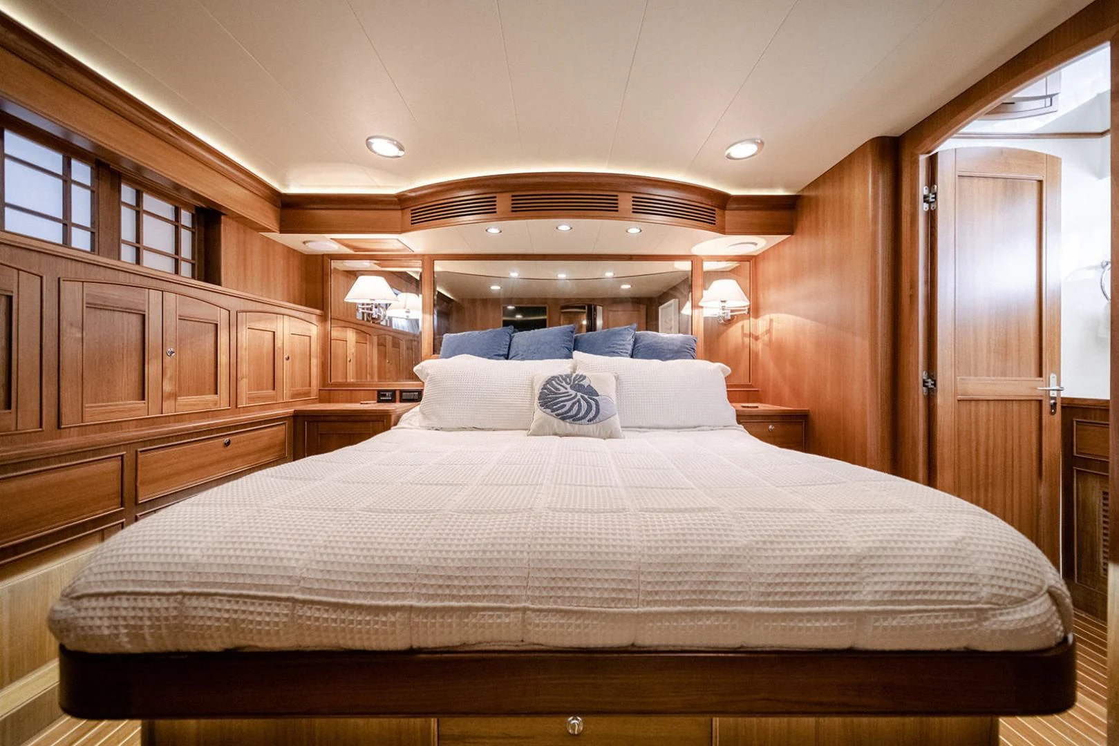 a large bed in a cabin aboard EASYWAY Yacht for Sale