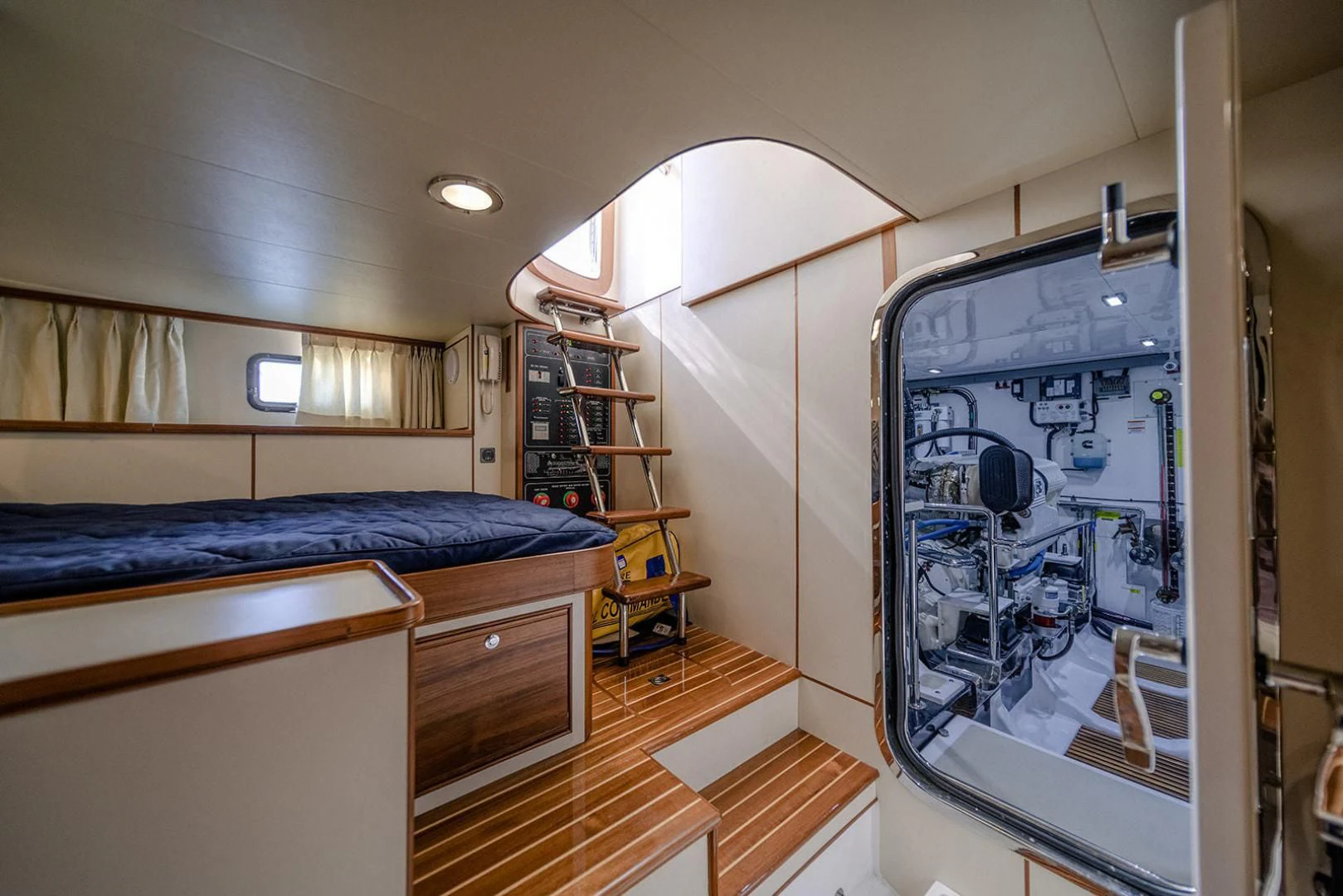 a bedroom with a large screen aboard EASYWAY Yacht for Sale