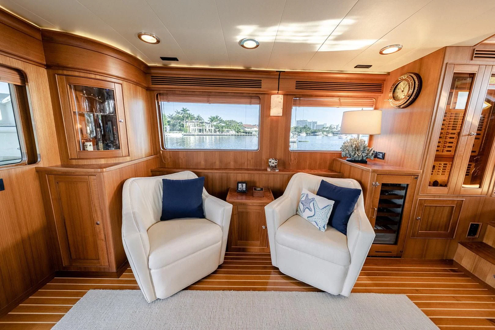 a living room with a couch and a table aboard EASYWAY Yacht for Sale
