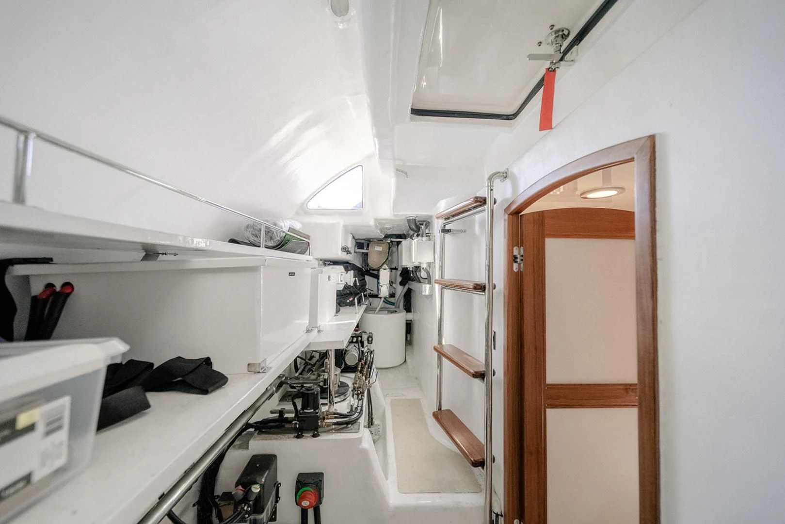 a room with a door and a mirror aboard EASYWAY Yacht for Sale