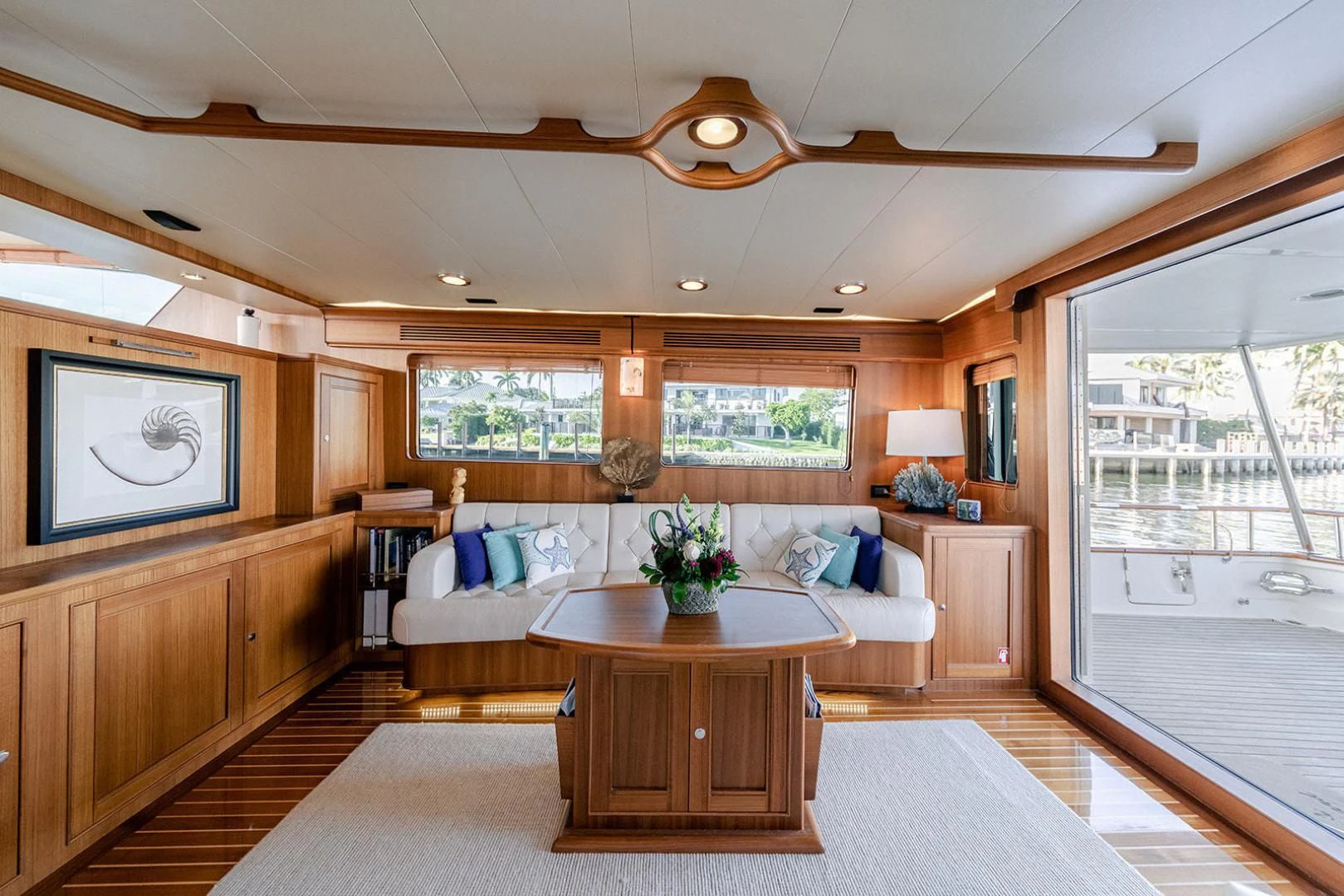 a large living room with a large window aboard EASYWAY Yacht for Sale