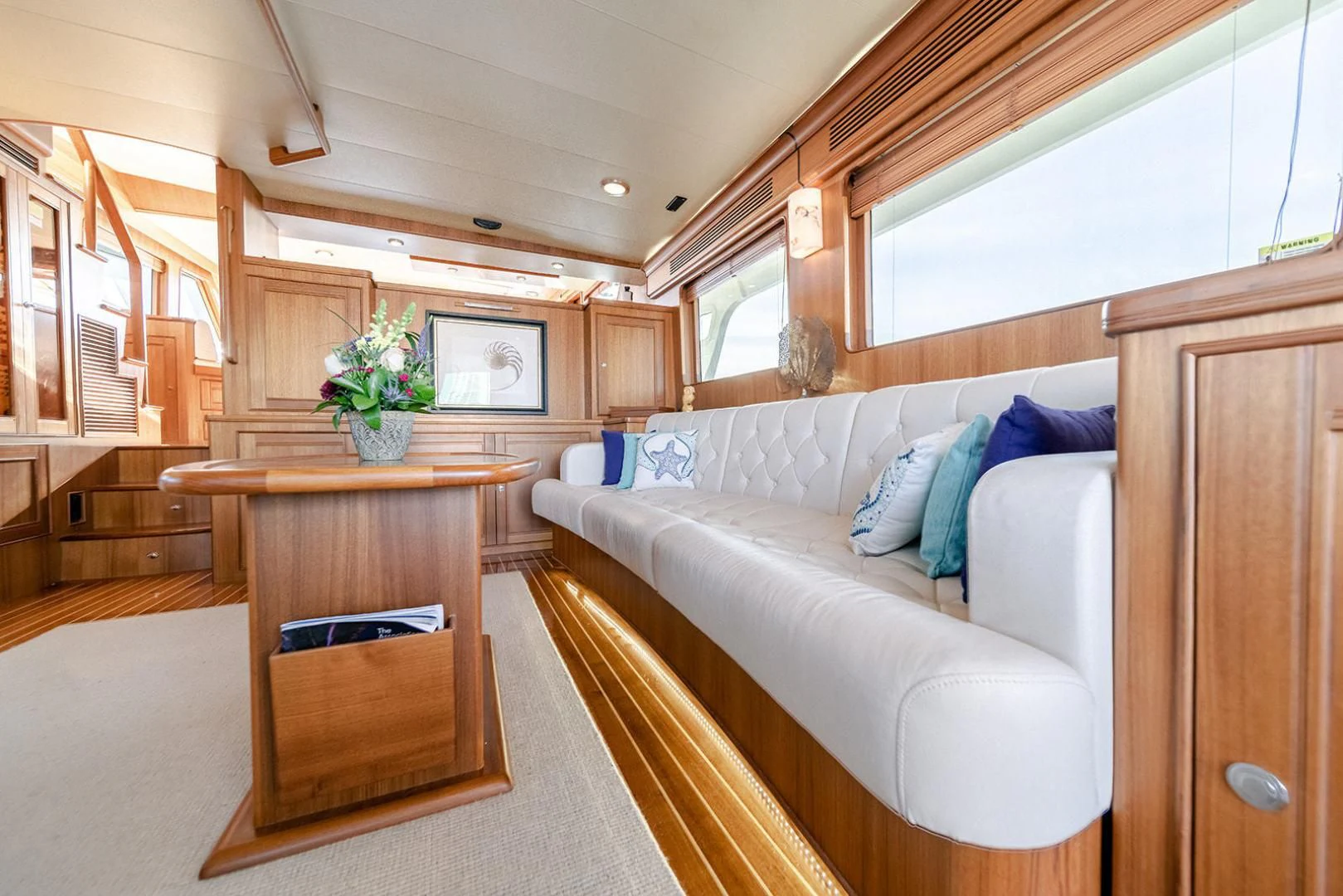 a room with a bed and a table aboard EASYWAY Yacht for Sale