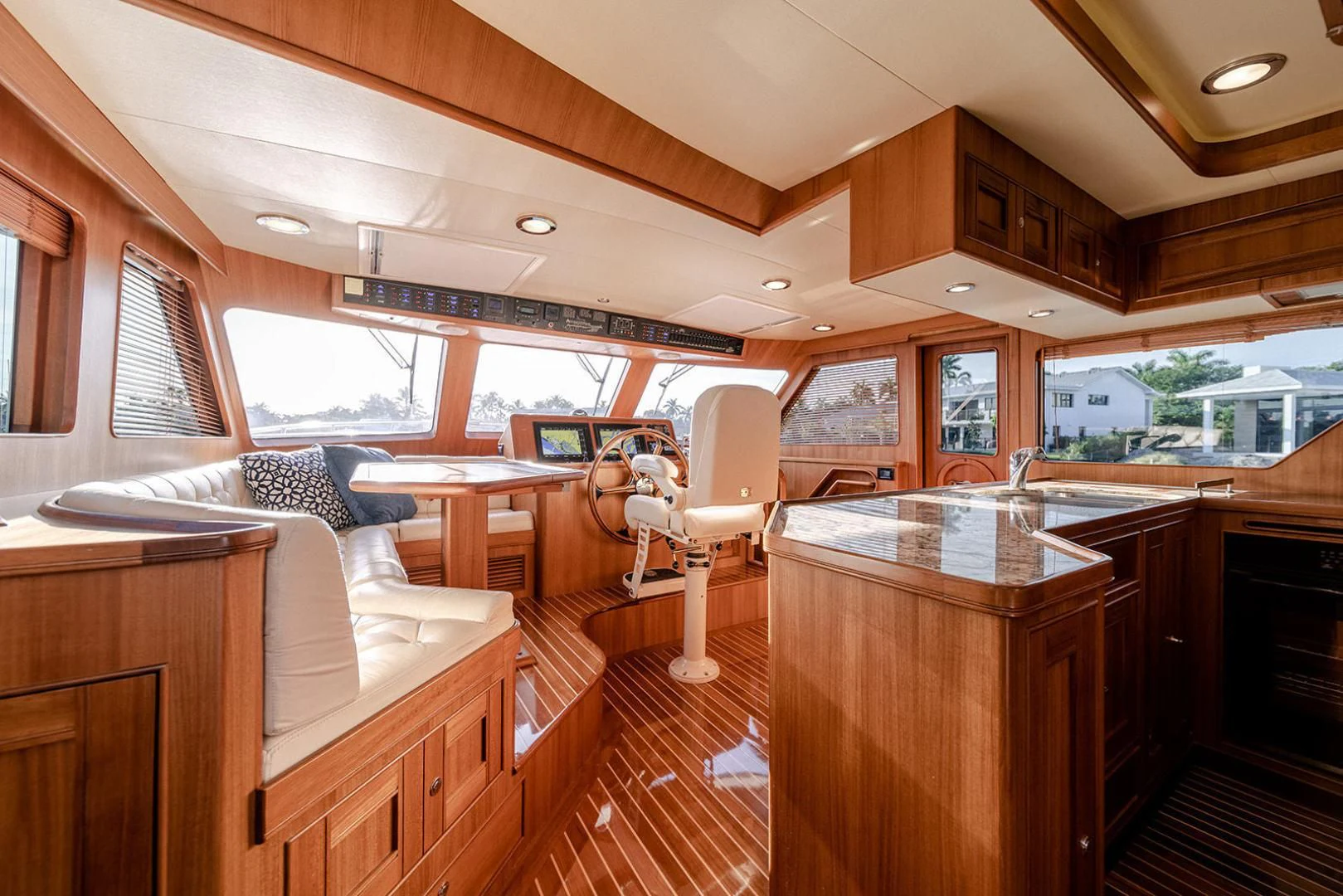 a large room with a table and chairs aboard EASYWAY Yacht for Sale