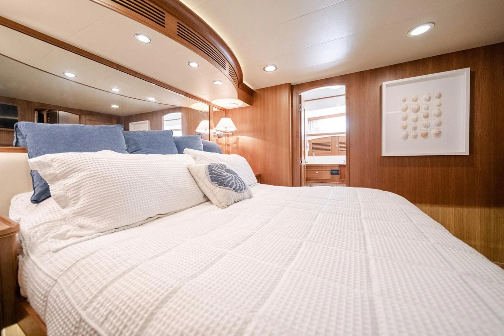 a bed with white sheets aboard EASYWAY Yacht for Sale