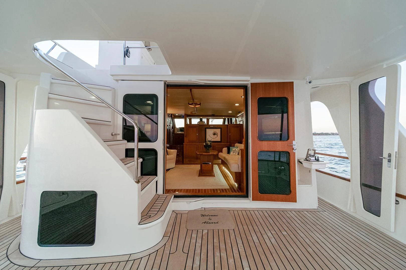 a room with a staircase and a window aboard EASYWAY Yacht for Sale