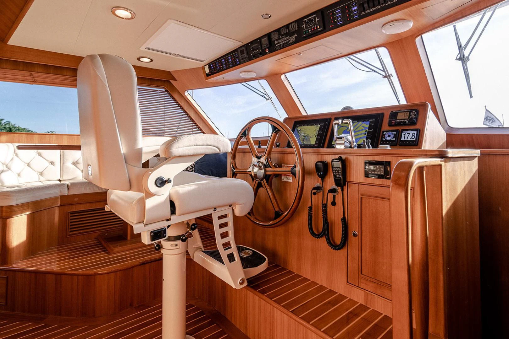 a boat with a steering wheel aboard EASYWAY Yacht for Sale