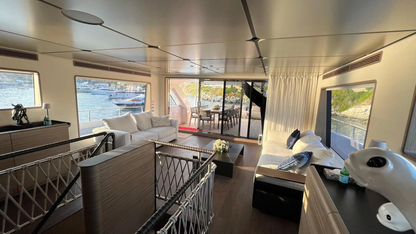 a living room with a large window aboard CHECKMATE Yacht for Sale
