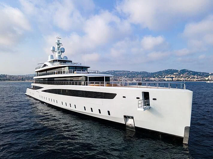a large white ship aboard DEFY Yacht for Sale