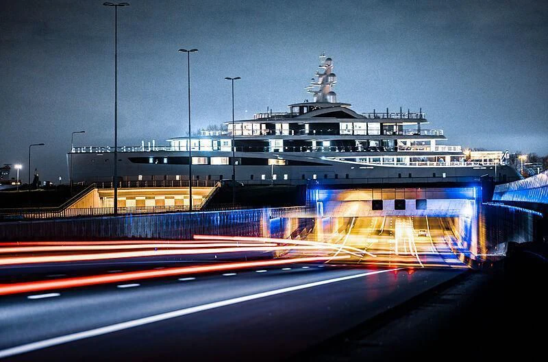 a large cruise ship in the water aboard DEFY Yacht for Sale