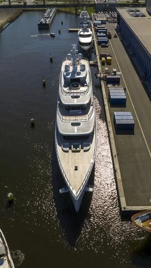 a group of boats on a river aboard DEFY Yacht for Sale