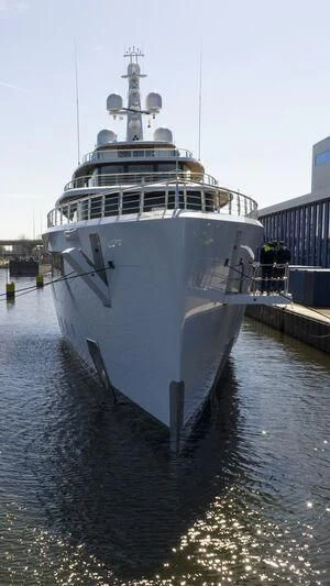 a large ship docked aboard DEFY Yacht for Sale