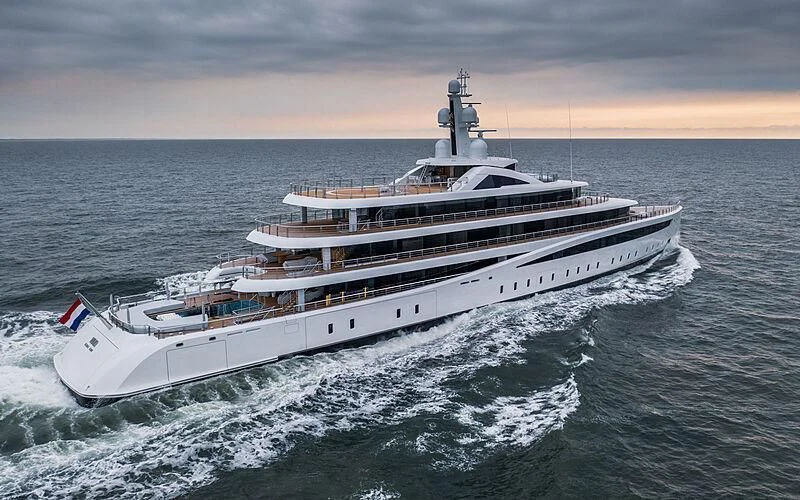 a large white ship aboard DEFY Yacht for Sale