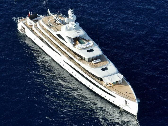 a white boat on the water aboard DEFY Yacht for Sale