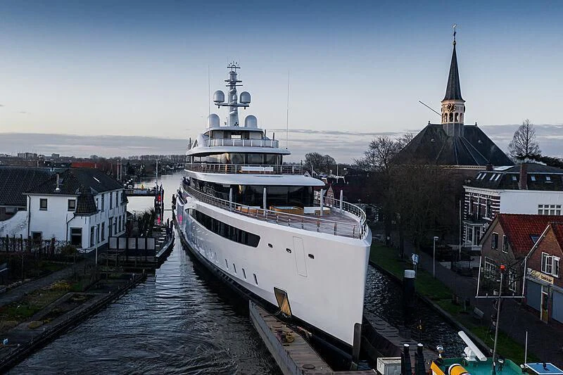 a large ship in a canal aboard DEFY Yacht for Sale