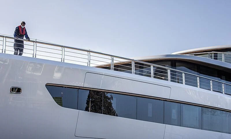 a person standing on a roof aboard DEFY Yacht for Sale