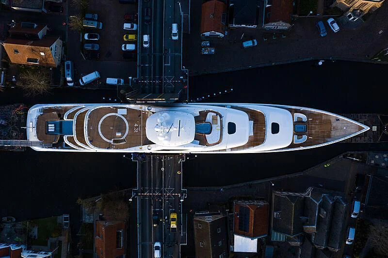 a large metal object with a white circle in the middle aboard DEFY Yacht for Sale